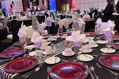 black-white-striped-tablecloths-red-charger-plate-circus-theme-corporate-decor-hilton-lac-leamy-13