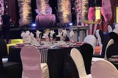 black-white-striped-tablecloths-red-charger-plate-circus-theme-corporate-decor-hilton-lac-leamy-14