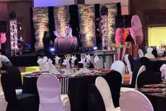 black-white-striped-tablecloths-red-charger-plate-circus-theme-corporate-decor-hilton-lac-leamy-15