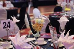 black-white-striped-tablecloths-red-charger-plate-circus-theme-corporate-decor-hilton-lac-leamy-17