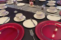 black-white-striped-tablecloths-red-charger-plate-circus-theme-corporate-decor-hilton-lac-leamy-2