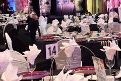 black-white-striped-tablecloths-red-charger-plate-circus-theme-corporate-decor-hilton-lac-leamy-22