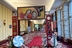black-white-striped-tablecloths-red-charger-plate-circus-theme-corporate-decor-hilton-lac-leamy-4