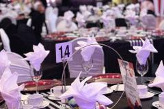 black-white-striped-tablecloths-red-charger-plate-circus-theme-corporate-decor-hilton-lac-leamy-6-1