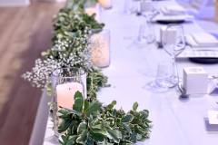 greenery-floral-arch-chair-covers-uplighting-babys-breath-metcalfe-hotel-ottawa-20