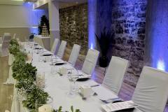 greenery-floral-arch-chair-covers-uplighting-babys-breath-metcalfe-hotel-ottawa-6