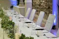 greenery-floral-arch-chair-covers-uplighting-babys-breath-metcalfe-hotel-ottawa-8